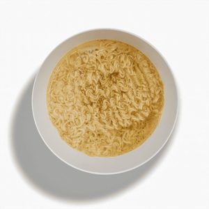 Vifon Ostro-Kwasna – orange packaging of hot and sour instant noodle soup with chili, garlic, and herbs beside a bowl of noodles.