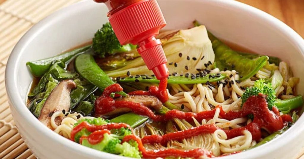 what is a sriracha – drizzle of sriracha on pho or ramen