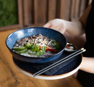 Vietnamese Food in Manchester: From Pho Bowls to Instant Comfort Assortment of Vietnamese food in Manchester featuring pho bowls with aromatic broth, rice noodles, and fresh herbs.